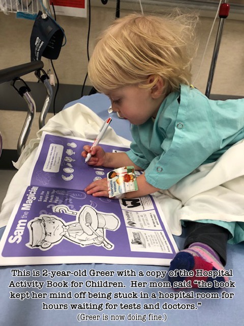 A young child coloring in a Hospital Activity Book for Children while sitting in a hospital room.