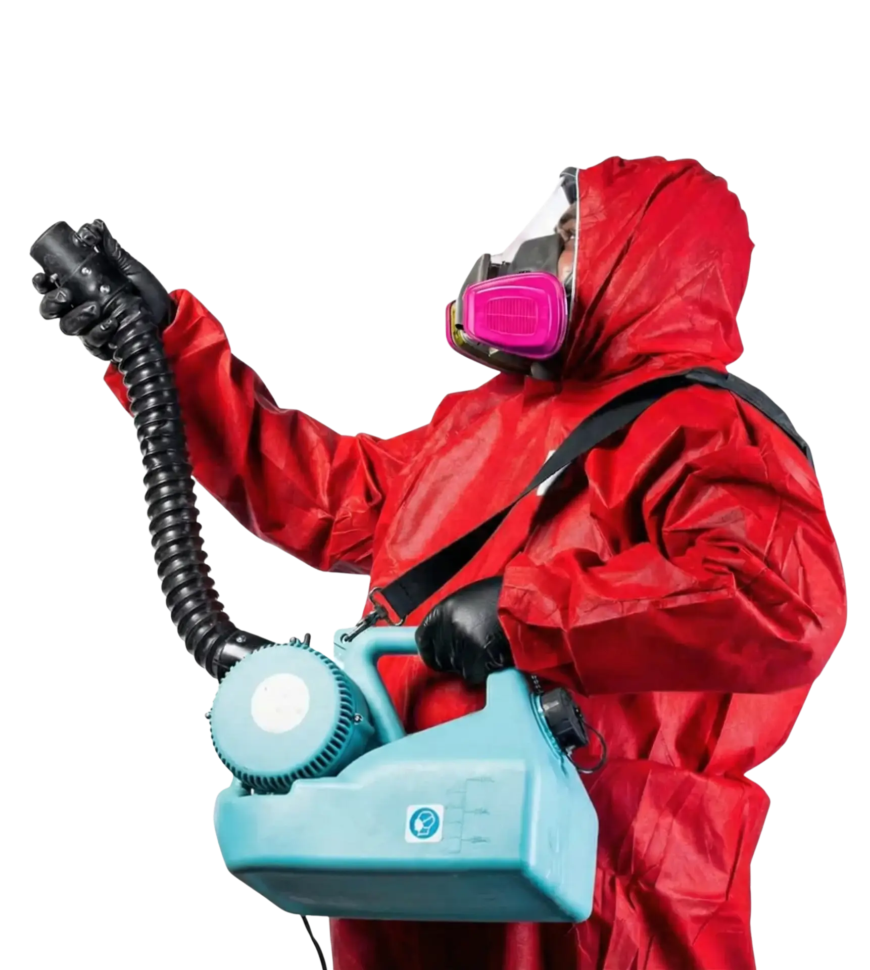 Restoration technician in full protective gear using a fogging machine for fire, smoke, or biohazard cleanup at Paulson Fire and Flood in the East Kootenays.